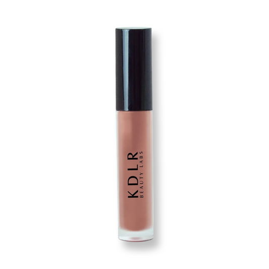 KDLR Beauty Labs' Power Drip Lip Gloss, showcasing radiant shine, full lips in shimmer and natural finishes, perfect for versatile, luxurious day-to-night lip makeup Variant: Bare