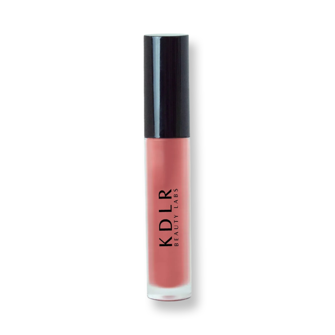 KDLR Beauty Labs' Power Drip Lip Gloss, showcasing radiant shine, full lips in shimmer and natural finishes, perfect for versatile, luxurious day-to-night lip makeup. Variant: Chestnut