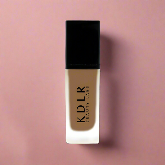 KDLR Beauty SPF Foundation Liquid Bottle Image - High Coverage Makeup. Variant: Brunette