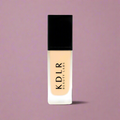 KDLR Beauty SPF Foundation Liquid Bottle Image - High Coverage Makeup. Variant: Peach