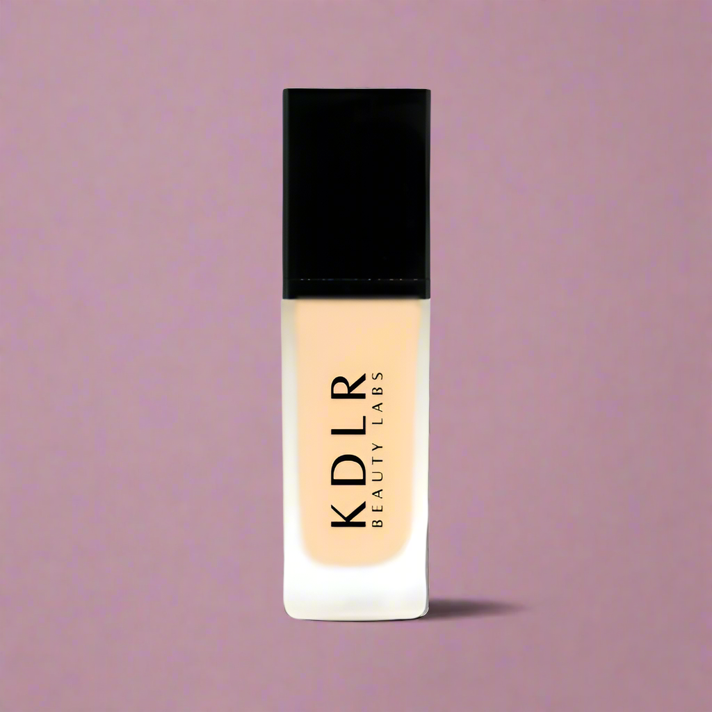 KDLR Beauty SPF Foundation Liquid Bottle Image - High Coverage Makeup. Variant: Peach