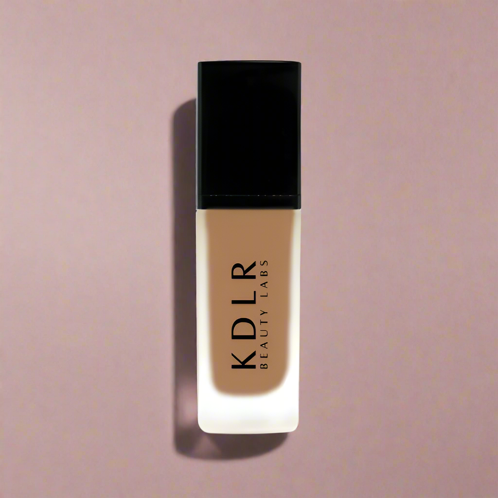 KDLR Beauty SPF Foundation Liquid Bottle Image - High Coverage Makeup. Variant: Rich Caramel