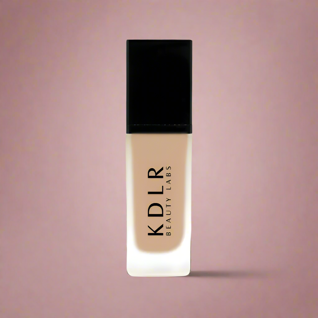 KDLR Beauty SPF Foundation Liquid Bottle Image - High Coverage Makeup. Variant: Sandstone