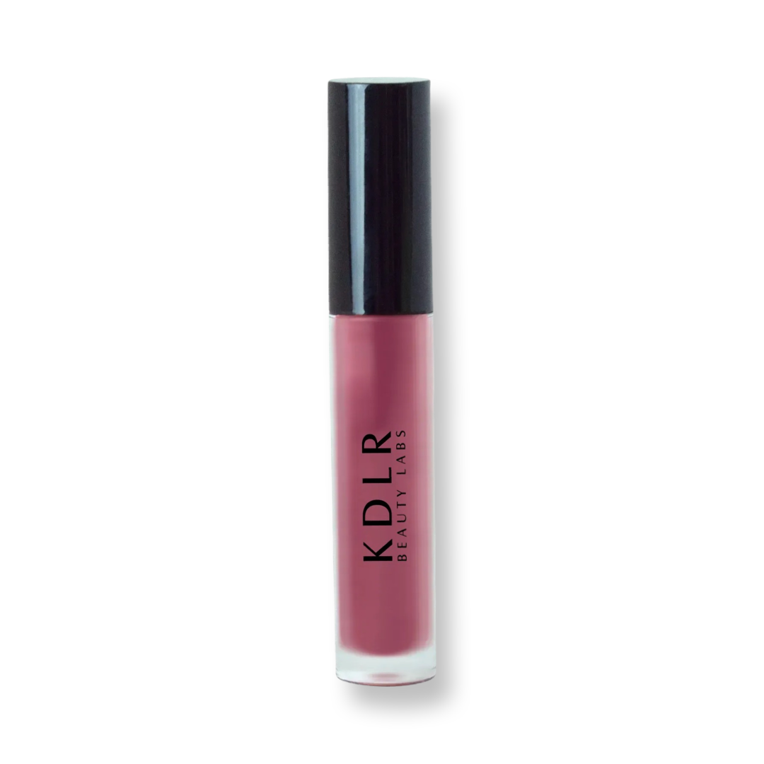 KDLR Beauty Labs' Power Drip Lip Gloss, showcasing radiant shine, full lips in shimmer and natural finishes, perfect for versatile, luxurious day-to-night lip makeup. Variant: Lavendar