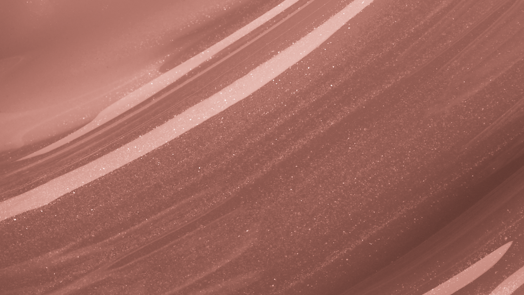 Swatch of KDLR Beauty Labs' Power Drip Lip Gloss, showcasing radiant shine, full lips in shimmer and natural finishes, perfect for versatile, luxurious day-to-night lip makeup Variant: Bare