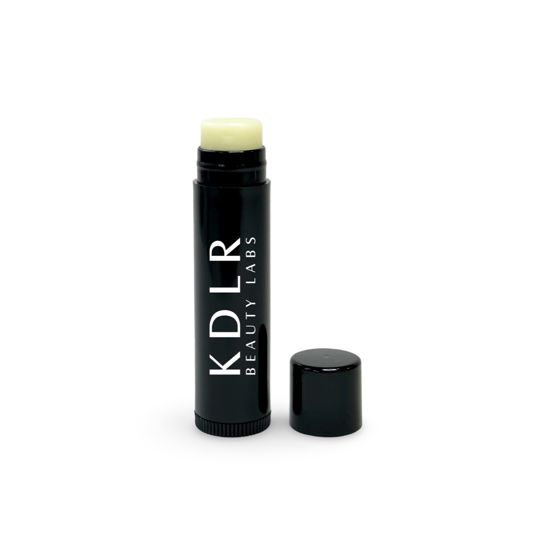 KDLR Beauty Labs Vegan Lip Balm in a small, convenient tube, ideal for nourishing and moisturizing lips on the go.