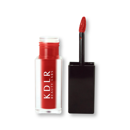KDLR Beauty Labs' SatinMatte Lip Stain, featuring enduring color with a velvety matte finish for all-day wear, buildable shades, unique doe-shaped applicator, vitamin E enriched, and an eco-friendly, vegan formula. Variant: Velvet Red