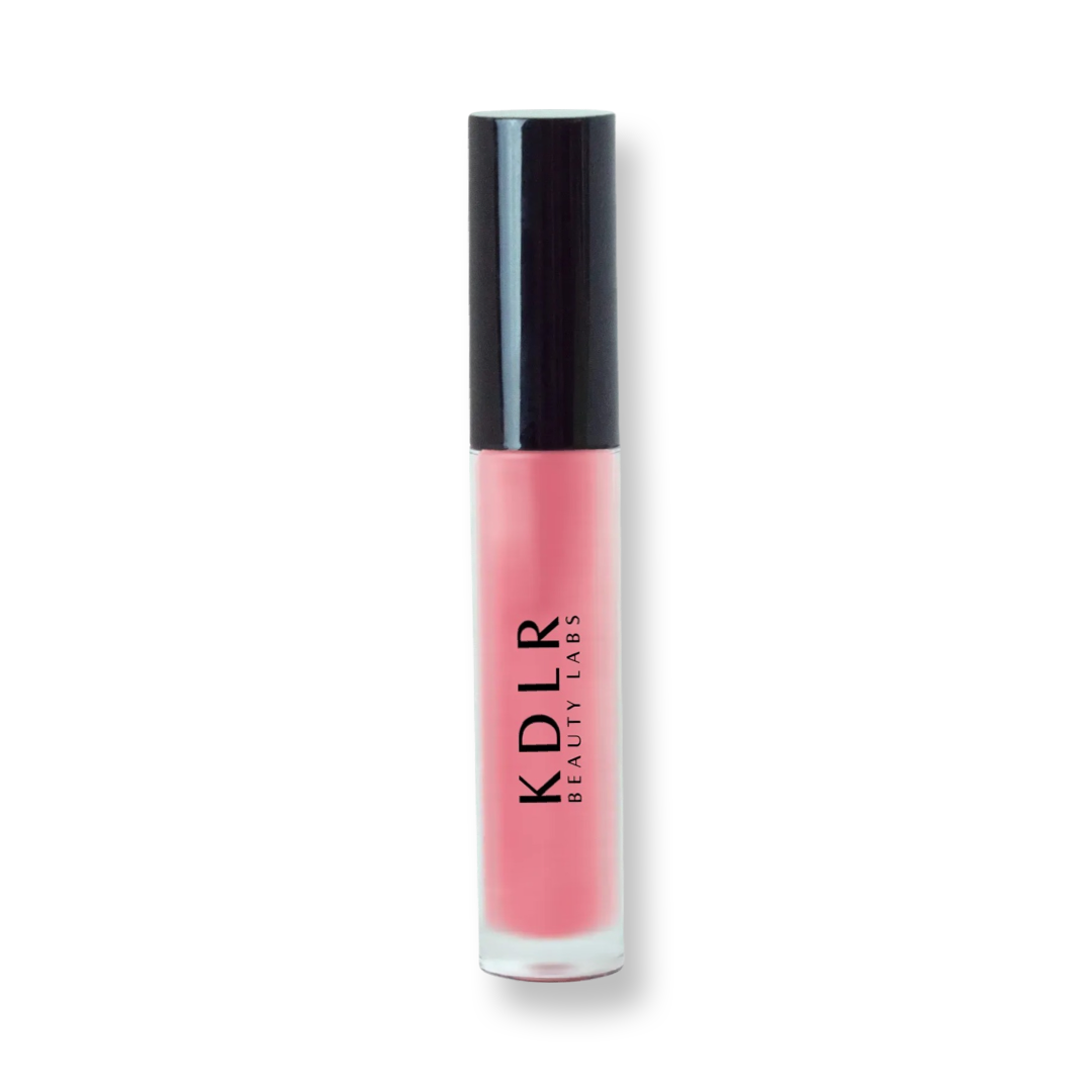 KDLR Beauty Labs' Power Drip Lip Gloss, showcasing radiant shine, full lips in shimmer and natural finishes, perfect for versatile, luxurious day-to-night lip makeup. Variant: Sienna