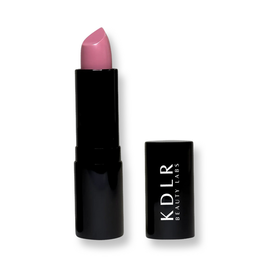 KDLR Beauty Labs' Noir Patent Cream Lipstick: vibrant, nourishing with argan oil, vitamin E, vegan, paraben-free, in sustainable packaging. Variant: Precious Pink