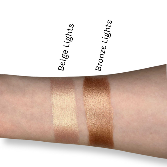 Swatch of KDLR Beauty Labs Effortlessly Radiant Highlighter Stick for a natural glow.