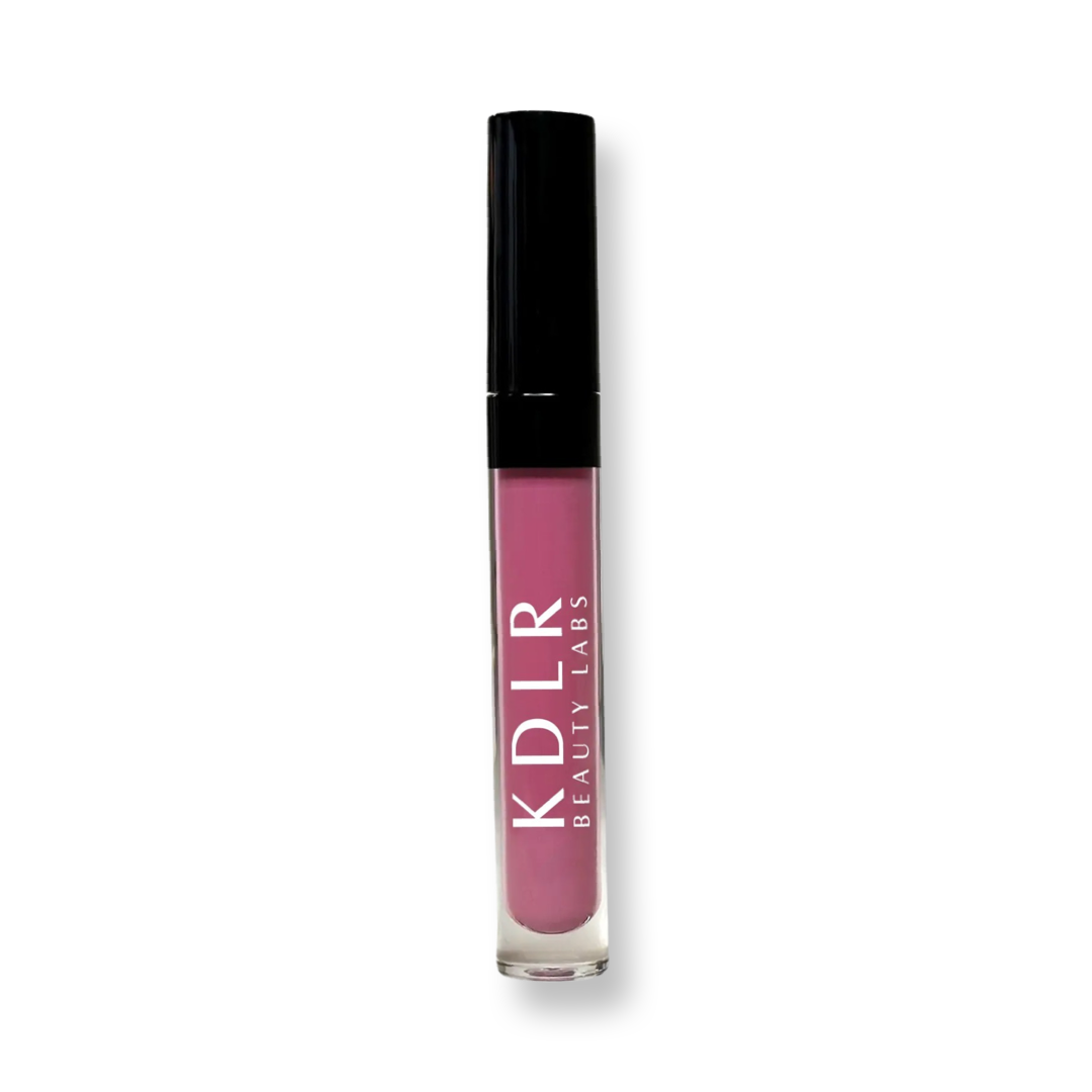 KDLR Beauty Labs MatteShift™﻿ Liquid Lipstick in various shades, showcasing its vegan, cruelty-free, smudge-proof formula transitioning from liquid to matte finish. Variant: Bombshell