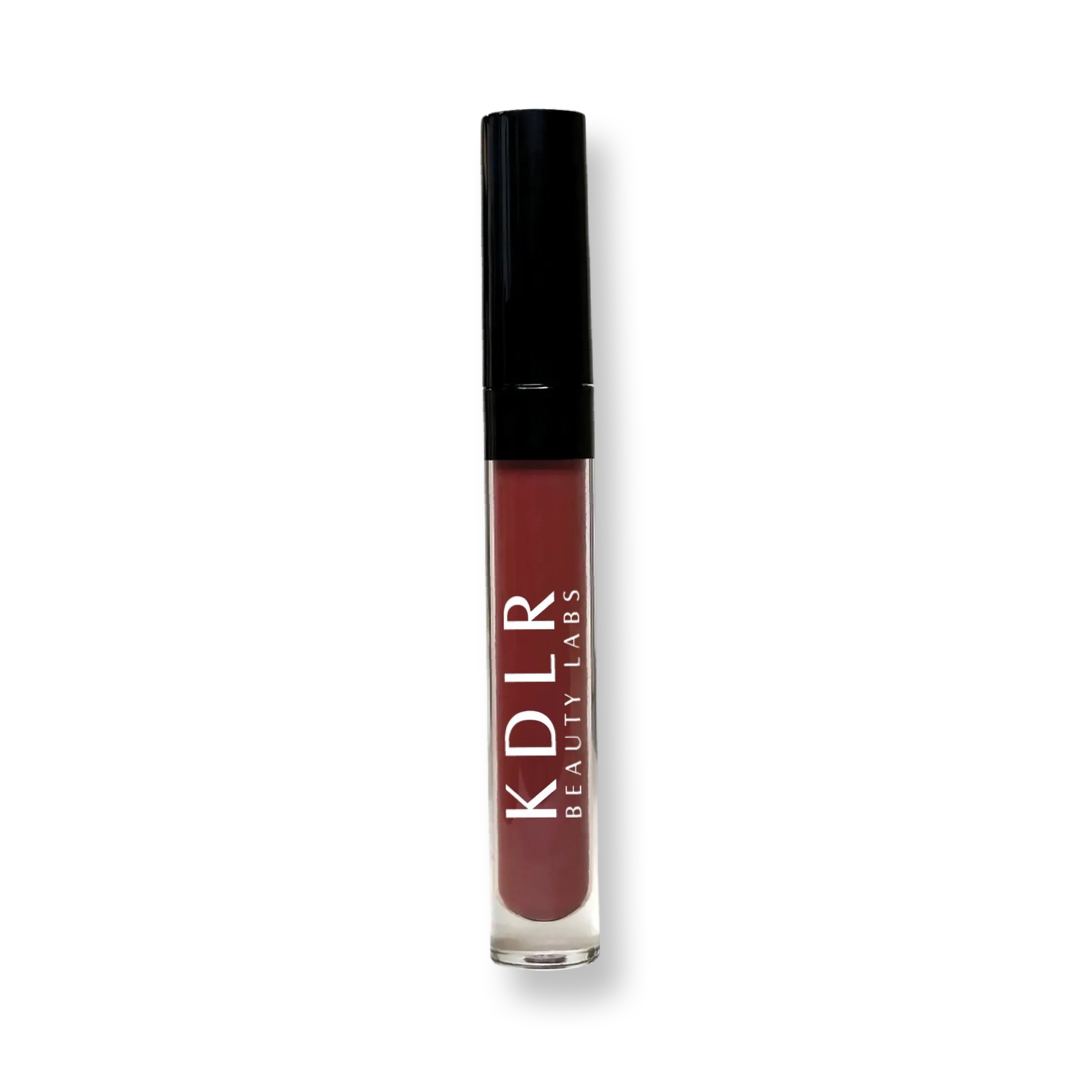 KDLR Beauty Labs MatteShift™﻿ Liquid Lipstick in various shades, showcasing its vegan, cruelty-free, smudge-proof formula transitioning from liquid to matte finish. Variant: Brickhouse