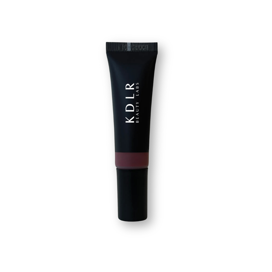 KDLR Beauty Labs Liquid Blush bottle, showcasing its vegan and cruelty-free label, with drops demonstrating its blendable and buildable formula for all skin types. Variant: Cherries