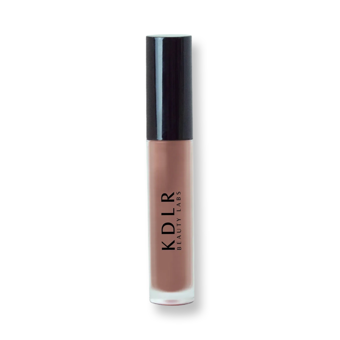 KDLR Beauty Labs' Power Drip Lip Gloss, showcasing radiant shine, full lips in shimmer and natural finishes, perfect for versatile, luxurious day-to-night lip makeup. Variant: Coco
