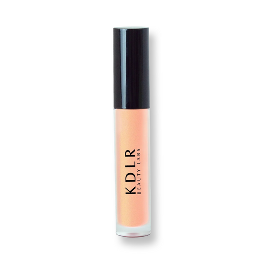 KDLR Beauty Labs' Power Drip Lip Gloss, showcasing radiant shine, full lips in shimmer and natural finishes, perfect for versatile, luxurious day-to-night lip makeup. Variant: Dripping Gold