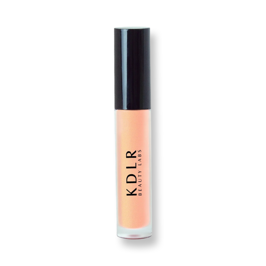 KDLR Beauty Labs' Power Drip Lip Gloss, showcasing radiant shine, full lips in shimmer and natural finishes, perfect for versatile, luxurious day-to-night lip makeup. Variant: Dripping Gold