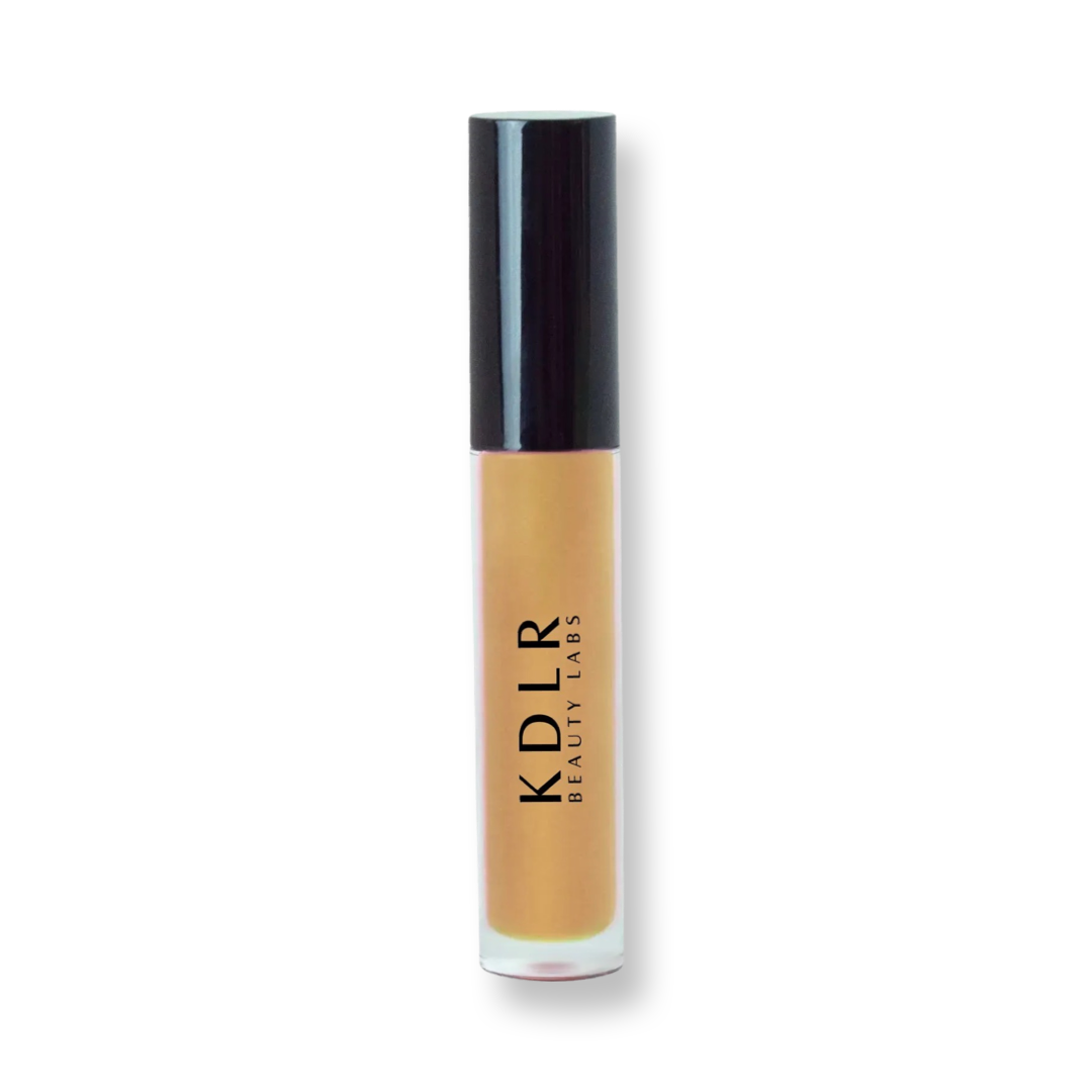 KDLR Beauty Labs' Power Drip Lip Gloss, showcasing radiant shine, full lips in shimmer and natural finishes, perfect for versatile, luxurious day-to-night lip makeup. Variant: Lemon Drop