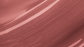 Swatch of KDLR Beauty Labs' Power Drip Lip Gloss, showcasing radiant shine, full lips in shimmer and natural finishes, perfect for versatile, luxurious day-to-night lip makeup. Variant: Warm Rose