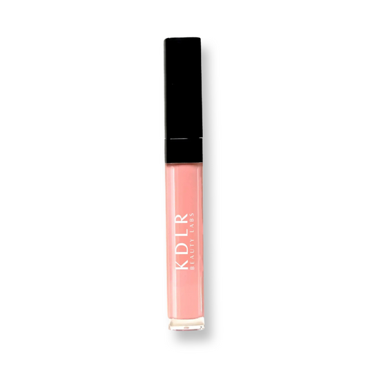 KDLR Beauty Labs Glow Infusion Lip Oils in all shades — vegan, hydrating lip oil for smooth luminous lips. Variant: My Treat. A sheer flesh tone.