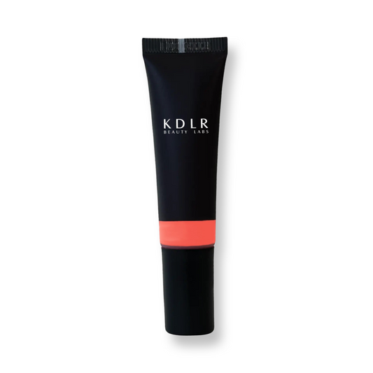 KDLR Beauty Labs Liquid Blush bottle, showcasing its vegan and cruelty-free label, with drops demonstrating its blendable and buildable formula for all skin types. Variant: Pinch