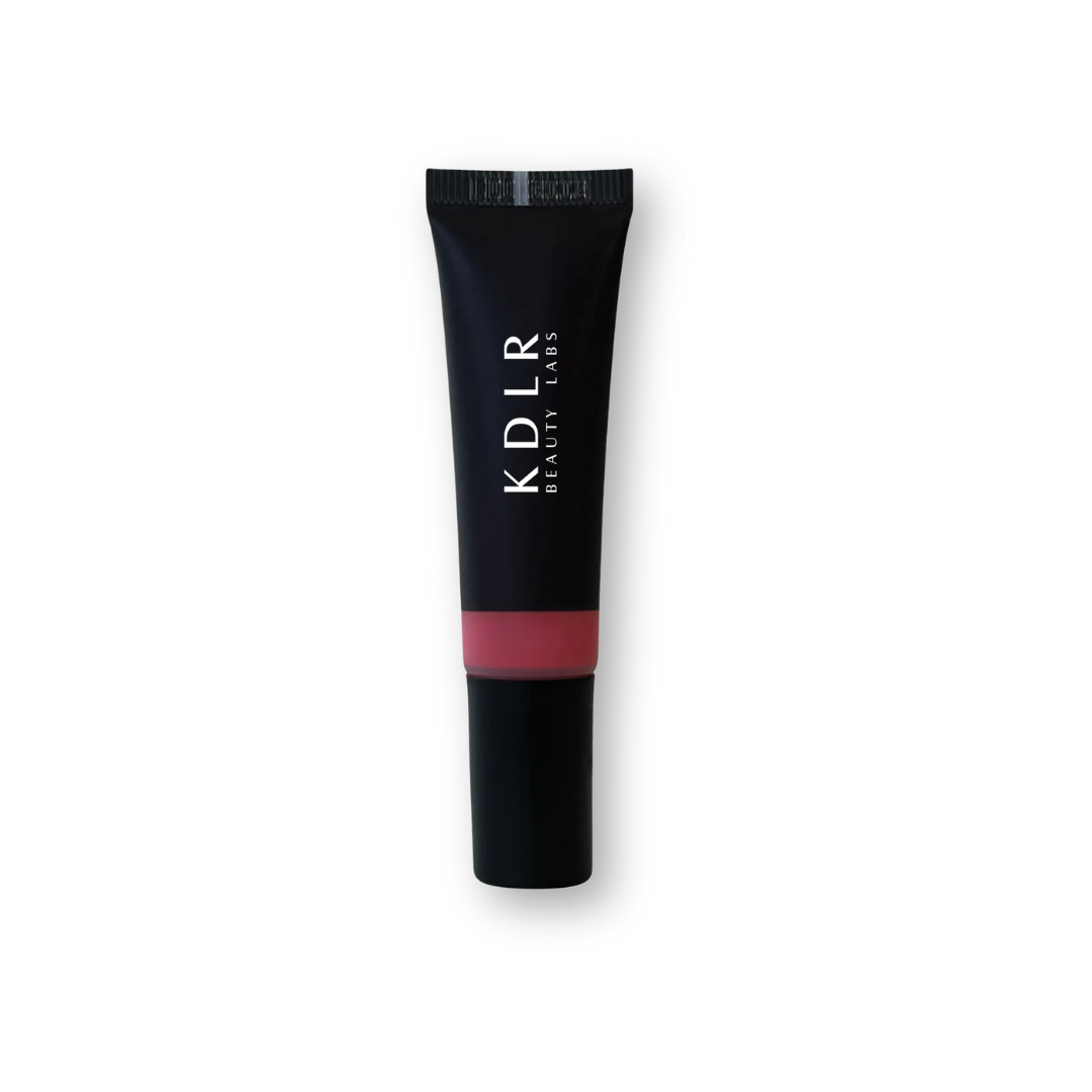 KDLR Beauty Labs Liquid Blush bottle, showcasing its vegan and cruelty-free label, with drops demonstrating its blendable and buildable formula for all skin types. Variant: Pinch