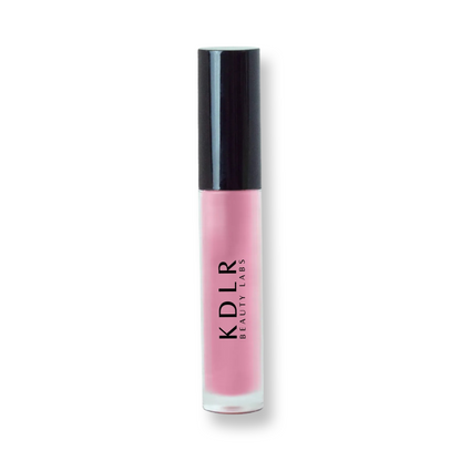 KDLR Beauty Labs' Power Drip Lip Gloss, showcasing radiant shine, full lips in shimmer and natural finishes, perfect for versatile, luxurious day-to-night lip makeup. Variant: Pinky