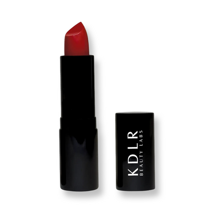 KDLR Beauty Labs' Noir Patent Cream Lipstick: vibrant, nourishing with argan oil, vitamin E, vegan, paraben-free, in sustainable packaging. 