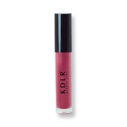 KDLR Beauty Labs' Power Drip Lip Gloss, showcasing radiant shine, full lips in shimmer and natural finishes, perfect for versatile, luxurious day-to-night lip makeup. Variant: Rouge