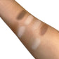 Swatch of UltimateGlow Contour Kit by KDLR Beauty Labs featuring eight versatile shades for all skin tones, designed for sculpting, defining, and highlighting with sustainable packaging.