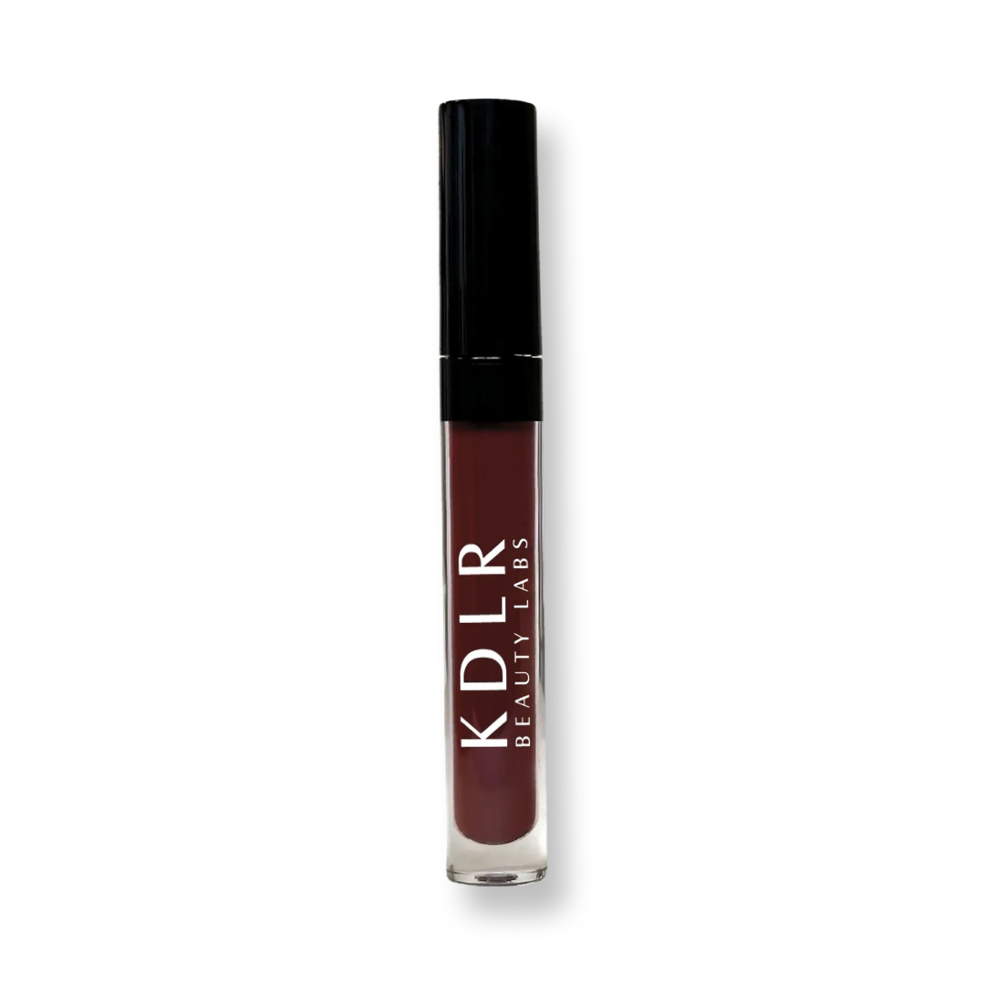 KDLR Beauty Labs MatteShift™﻿ Liquid Lipstick in various shades, showcasing its vegan, cruelty-free, smudge-proof formula transitioning from liquid to matte finish. Variant: Vixen